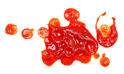 Ketchup, tomato sauce, droplets isolated on white background, top view	