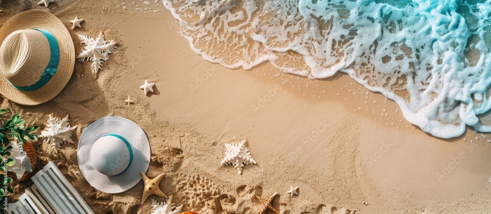 Poster a bird's-eye view of a sandy beach showcasing summer items with empty space for adding text or image