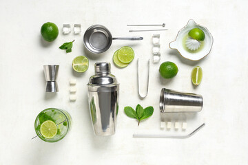 Ingredients and tools for preparing fresh Mojito cocktail  on white background