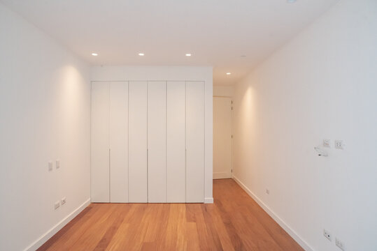 empty room with white wall and window