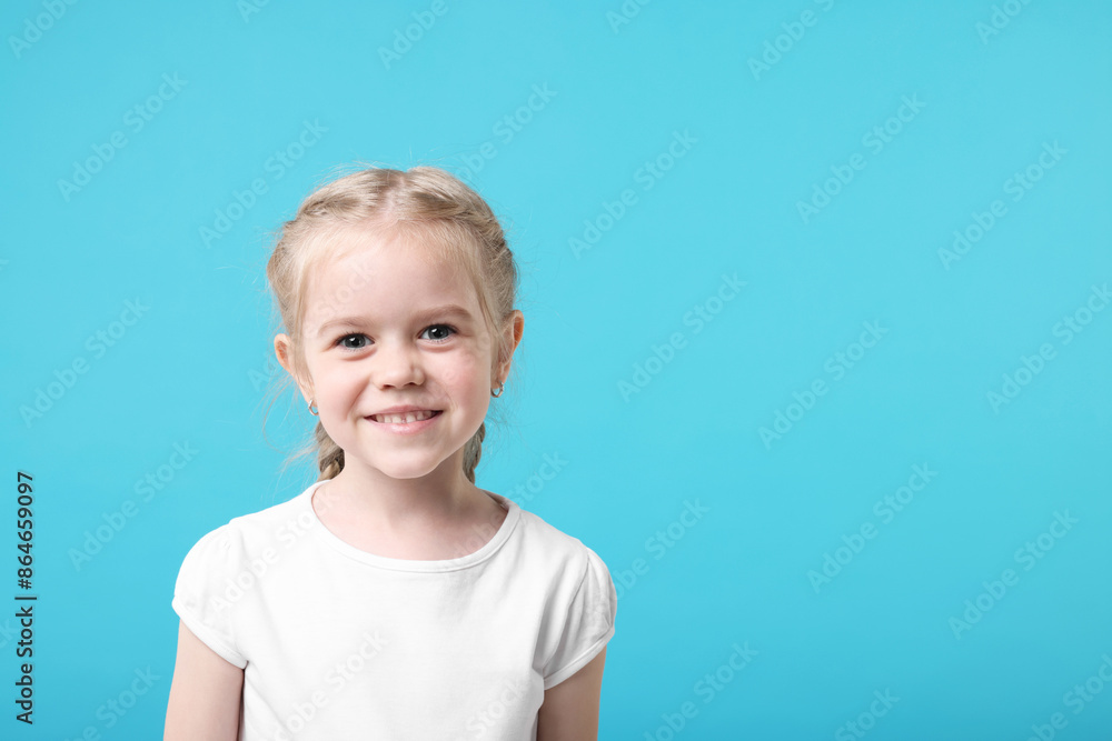 Sticker Portrait of cute little girl on light blue background, space for text