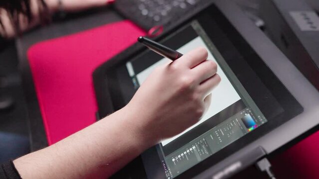 Female illustrator draws. Woman works coding. Digital designer look tablet pad. Girl hold pen. Freelance artist use hand drawing app. Develop job skill. 

