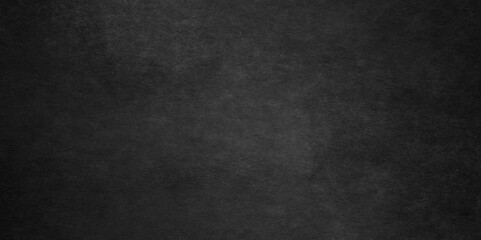 Abstract black stone wall texture grunge rock surface. dark gray background backdrop. wide panoramic banner. old wall stone for dark black distressed grunge background wallpaper rough concrete wall.