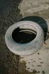 Old, used tire, showcasing signs of wear and tear, ideal for recycling or upcycling projects