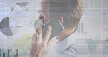 Image of statistical data processing against caucasian man talking on smartphone at office