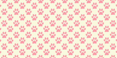 A pink background with white paw prints