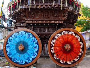 Wheels of Traditional Hindu temple Chariot for God decorated colorful in Tamil Nadu 