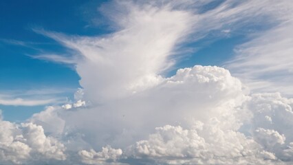 Fototapeta premium blue sky with white clouds and a plane flying in the middle of the sky