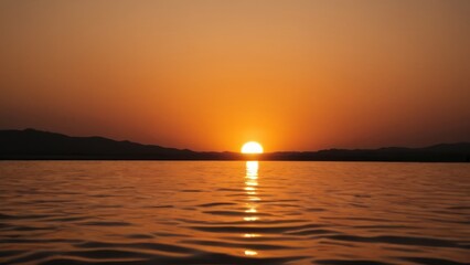 Naklejka premium a photograph of the sun is setting on the horizon of a lake in the middle of the desert