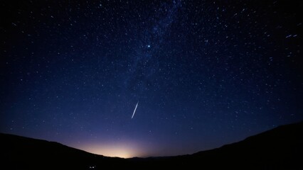 Obraz premium night sky filled with lots of stars and a shooting star in the middle of the night