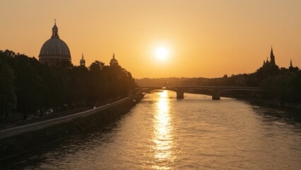 Obraz premium a photograph of the sun is setting over a river with a bridge in the foreground and a tower in the distance
