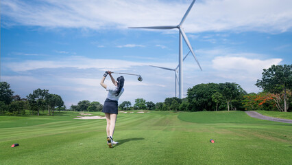 Fototapeta premium Professional woman golfer teeing golf in golf tournament competition at golf course for winner 