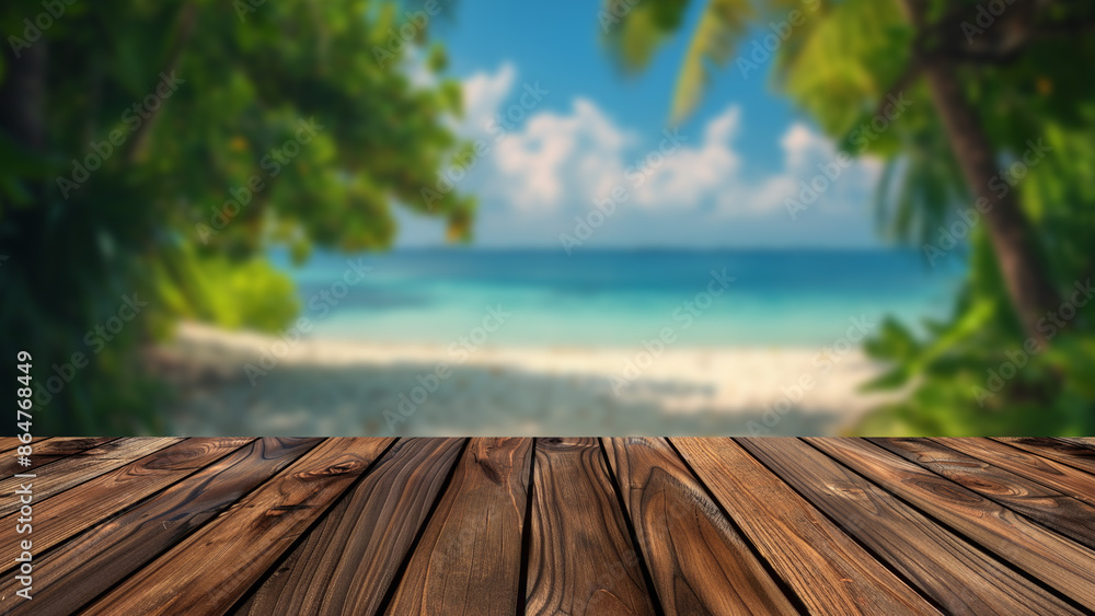 Poster wooden table with a background of a blurred summer beach and palm trees, providing a scenic setting 