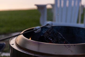 Marshmallow above fire pit 