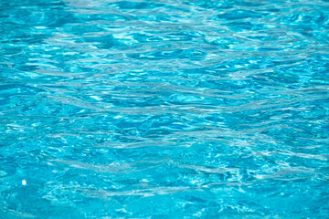 Background of water, surface blue swimming pool.