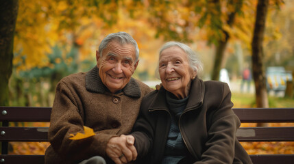 Elderly Couple Smiling Holding Hands Park Bench