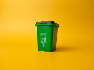 Mini Waste Bin on a yellow background