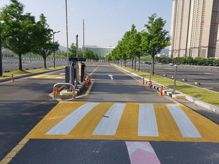 Image of a large parking lot operated by a large outlet company