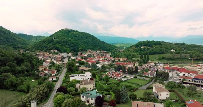 Aerial view cityscape Cornuda Italy. Architecture of houses on the streets in the urban landscape of the city in the mountains. High quality 4k footage