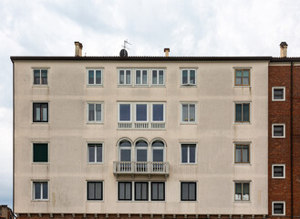 Fototapeta premium View to typical house in Venice with windows with shutters