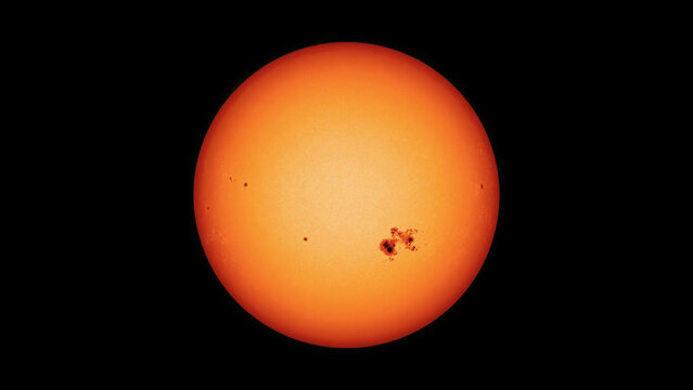 Big sunspot on the surface of the sun, with solar flares and energy.