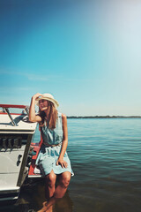 Space, relax or happy woman on boat in ocean for travel, vacation or holiday on summer adventure. Mockup, tourist or person with smile, peace or inspiration on yacht on sea for weekend trip in Greece