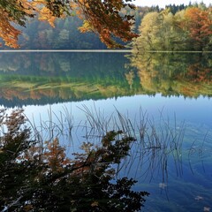 Reflection on the lake surface: The calm lake surface reflects an autumn scenery. The lake water is crystal clear and the reflection is clearly visible. Natural seasonal changes, generated by AI, high