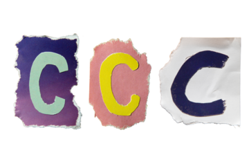C alphabet torn from a magazine paper on white background. Ransom note style letters.