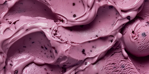 A closeup of artisanal blackberry ice cream, its rich color swirled with cream against a white background