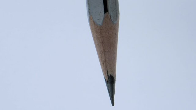 Putting pencil in sharpener closeup