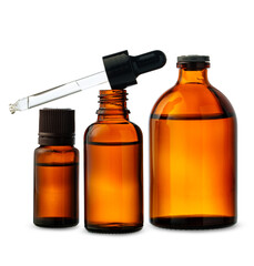 Three Amber Glass Dropper Bottles With Dropper Against White Background