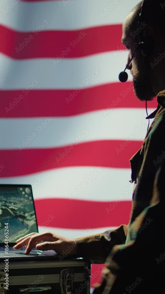 Poster vertical video us air force agent using radar system on laptop to detect incoming ballistic missiles