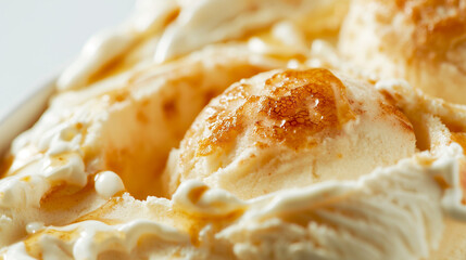 Luxe creme brulee ice cream, a closeup of luxe creme brulee ice cream, its creamy texture and caramelized surface against a white backdrop