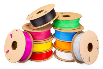 stack pile of colorful  3d printing filament PLA material on environmentally friendly and recyclable paper cardboard spools isolated white background. modern FDM printer technology concept