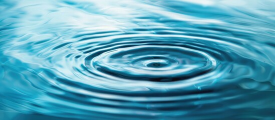 An artistic depiction of a solitary water ripple spreading amidst a range of blue shades, representing serenity and peace.
