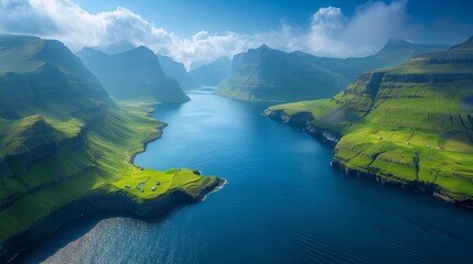 Breathtaking aerial view of faroe islands fjord surrounded by lush green mountains
