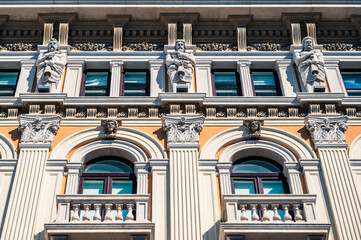 Historic city of Trieste. Between ancient buildings and reflections on the sea. Autumn day and...