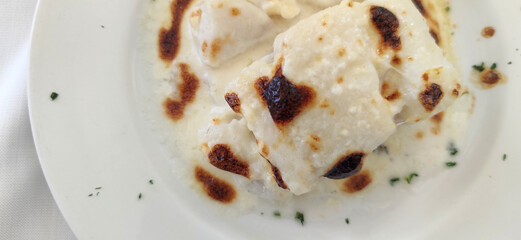 gratin with cream and cheese as savory food