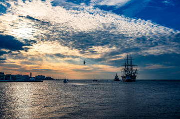 Historic city of Trieste. Between ancient buildings and reflections on the sea. Autumn day and...
