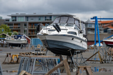 Lonely laid up boat at a marina lay up site.