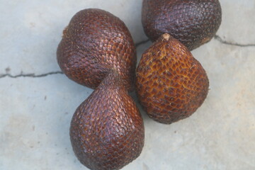 Salak fruit or thorny palm or Indonesian salak fruit Salak (Salacca zalacca) is a species of palm tree (Arecaceae family) that has a sweet taste and is comfortable to bite.