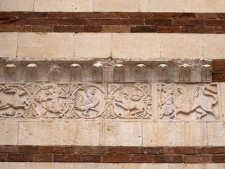 Verona dome cathedral church exterior sculptures detail. Romanesque sculpture attributed to the workshop of Veronese sculptor Brioloto