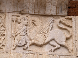 Verona dome cathedral church exterior sculptures detail. Romanesque sculpture attributed to the workshop of Veronese sculptor Brioloto