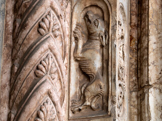 Verona dome cathedral church exterior sculptures detail. Romanesque sculpture attributed to the workshop of Veronese sculptor Brioloto