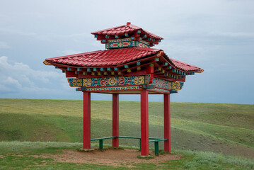 Gazebo in the traditional national style in the steppe. The Republic of Kalmykia. Russia
