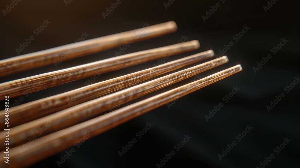 Poster a stack of chopsticks placed neatly on a table