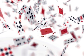 A group of playing cards suspended in mid-air, as if they're floating away