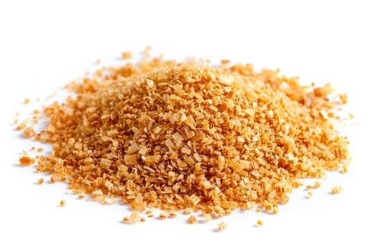 A messy pile of bread crumbs on a white surface