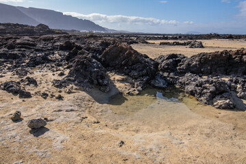Desert landscape, mountains, rocks and desert. Lanzarote, Canary Islands, Spain.