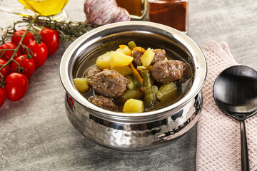 Soup with meatball and potato